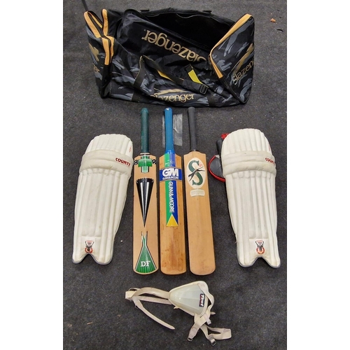 193 - A Slazenger cricket bag c/w some Cricket gear including three bats.