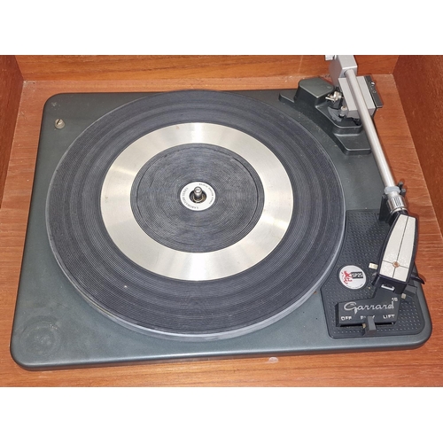 199 - Two vintage Garrard turntables. Both appear complete but not tested.