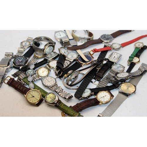 168 - A collection of quality ladies and gents fashion quartz watches, Citizen, Gruen, J-Axis etc. All wit... 