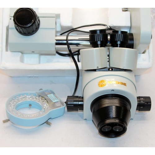 169 - Japanese Sunshine binocular stereo microscope with LED light. Complete and in original packaging