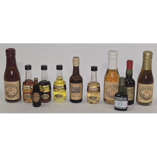 20 - A small quantity of miniatures to include some vintage local bottles.