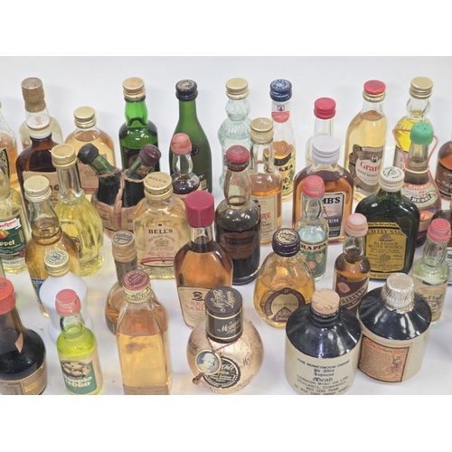25 - Large quantity of 70+ alcohol miniatures to include some vintage examples.