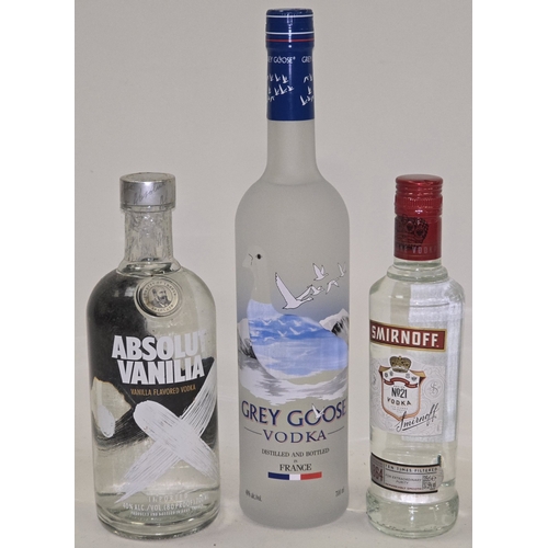 32 - 3 x bottles vodka to include Grey Goose 70cl, Absolut Vanilla 70cl and Smirnoff 35cl (REF P97, P80).
