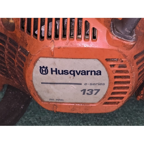234 - Husqvarna e-series 137 petrol chainsaw.