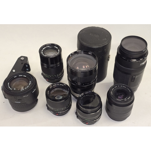 129 - Collection of camera lenses to include Canon. Seven in all.