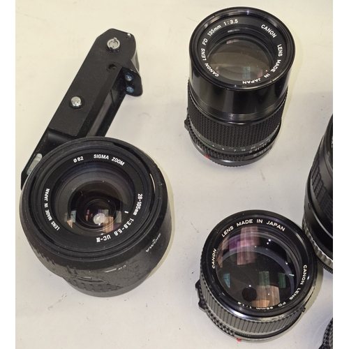 129 - Collection of camera lenses to include Canon. Seven in all.