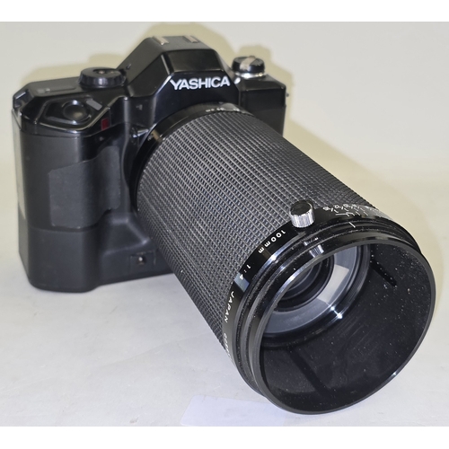 131 - Yashica Dental-Eye II 35mm SLR film camera c/w 100mm 1:4 lens.