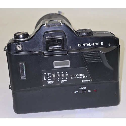 131 - Yashica Dental-Eye II 35mm SLR film camera c/w 100mm 1:4 lens.