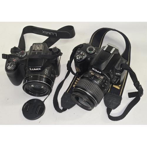 132 - Nikon D40 DSLR camera c/w Nikon DX 18-55mm lens together with Lumix DMC-FZ200 digital camera (2).
