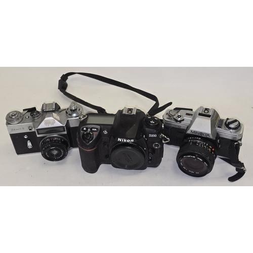 134 - Nikon D200 DLSR camera body together with Minolta X-300 vintage 35mm SLR film camera c/w lens and Ze... 