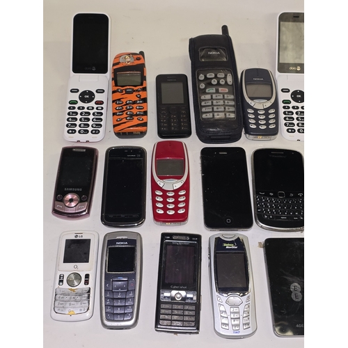 139 - A large collection of mobile phones and other handheld electricals. Various makes and models. 28 in ... 
