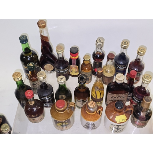 53 - A good collection of mainly vintage alcohol miniatures. Various brands. Approx 60 bottles in all.