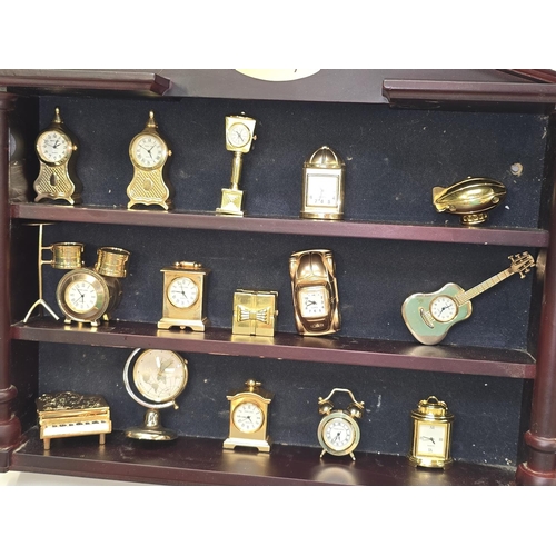 A large collection of miniature clocks together with some contemporary ...