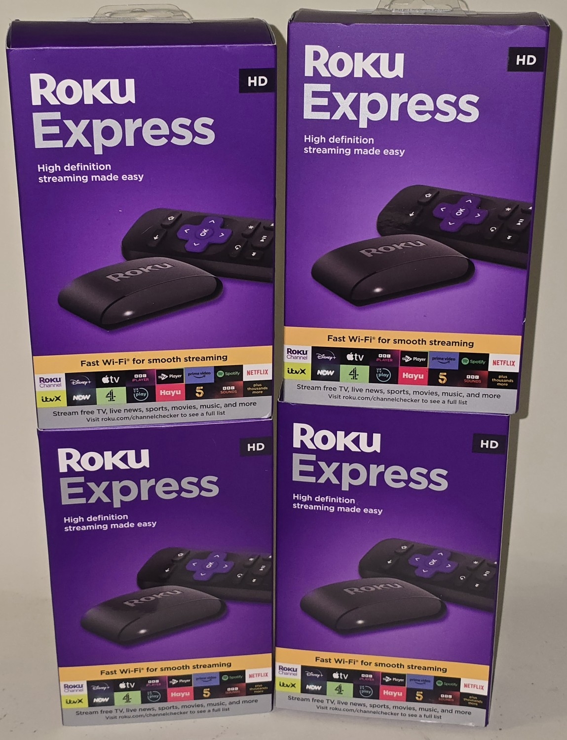 Collection of four Roku Express boxed streaming devices (REF 31).