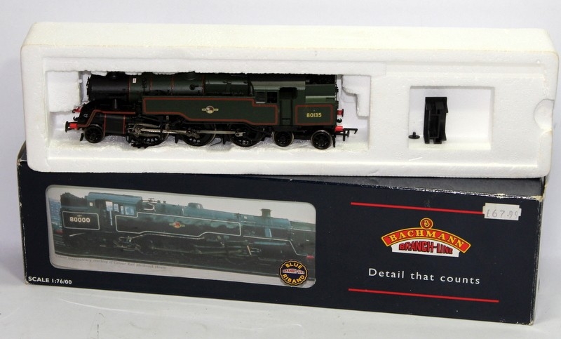A quantity of OO gauge rolling stock to include a boxed Bachmann 4MT ...