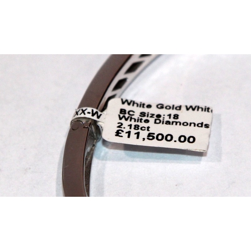 274 - Stunning 18ct white gold and diamonds bangle  bracelet. Embellished with 2.18 carats of diamonds.  B... 