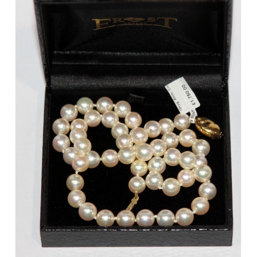 267 - Necklace of cultured pearls, 51 8mm pearls fastened by a 9ct gold clasp. 18
