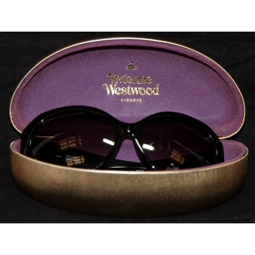 10 - Genuine Vivienne Westwood  Sunglasses. In good condition with signs of wear and in original clam she... 