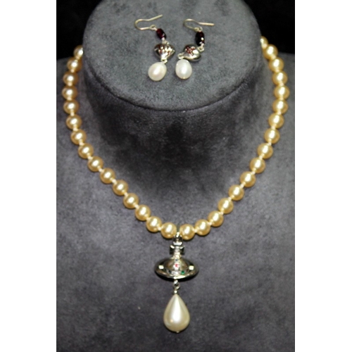 11 - Genuine Vivienne Westwood Jewellery: Faux pearl with jewelled signature orb choker c/w drop pearl an... 