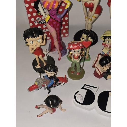 112 - Quantity of mostly Betty Boop related collectables to include figurines, alarm clock, mug sets etc.
