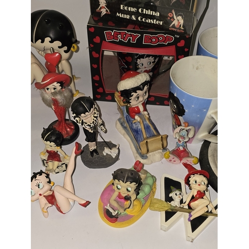 112 - Quantity of mostly Betty Boop related collectables to include figurines, alarm clock, mug sets etc.
