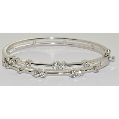 253 - 18ct white gold Diamond twin bar split bangle of 1ct diamonds (New).