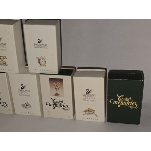 121 - A collection of boxed Swarovski crystal to include many 