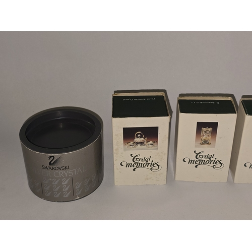 121 - A collection of boxed Swarovski crystal to include many 