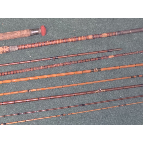 85 - A collection of vintage/antique split cane fishing rods.