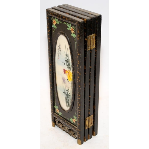 76 - Miniature Oriental wooden hinged screen of four panels each featuring a hand painted porcelain oval.... 