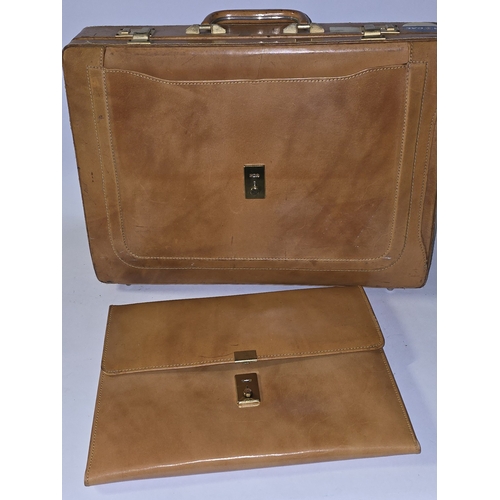 78 - Vintage quality tan leather briefcase with lift out separate attache/document file. Shows some signs... 
