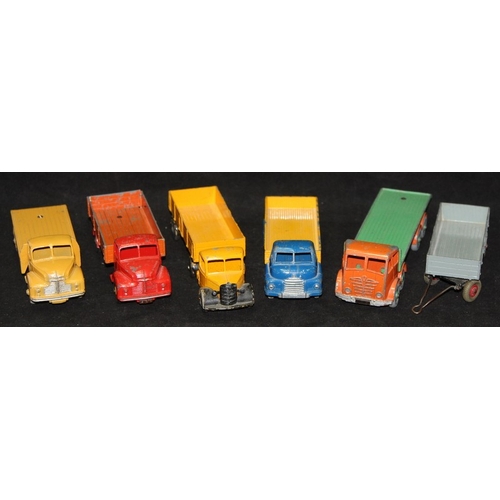 132 - A collection of vintage Dinky die-cast flatbed trucks: Leyland, Foden, Bedford etc. 5 in lot plus tr... 