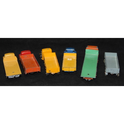 132 - A collection of vintage Dinky die-cast flatbed trucks: Leyland, Foden, Bedford etc. 5 in lot plus tr... 