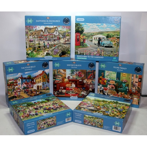 137 - A collection of traditional Gibsons 1000 piece jigsaw puzzles. 7 in lot.