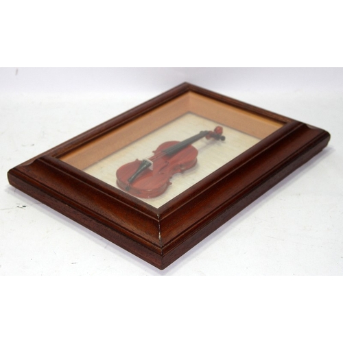 52 - Vintage framed hand crafted miniature Stradivarius.  Cremona violin. Approx 19cms in length, o/all f... 