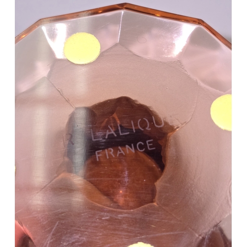 50 - 'R LALIQUE / FRANCE', An amber or peach glass Bacchantes type vase, moulded with three female nudes ... 