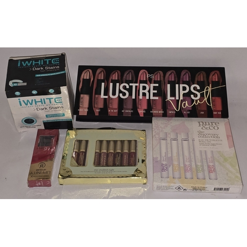 67 - A collection of various make up and cosmetics to include Max Factor, Pure & Co. and iWhite.