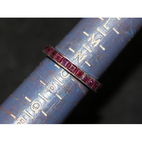 249 - Vintage white metal set ruby eternity ring size O. 3.2g