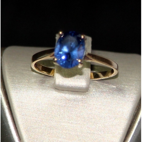219 - 9ct gold approx 1.2ct Tanzanite solitaire ring size Q. 2g