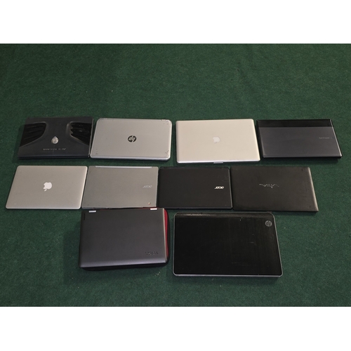 57 - A collection of various laptops to include Apple, Lenovo, HP etc. Ten in all.