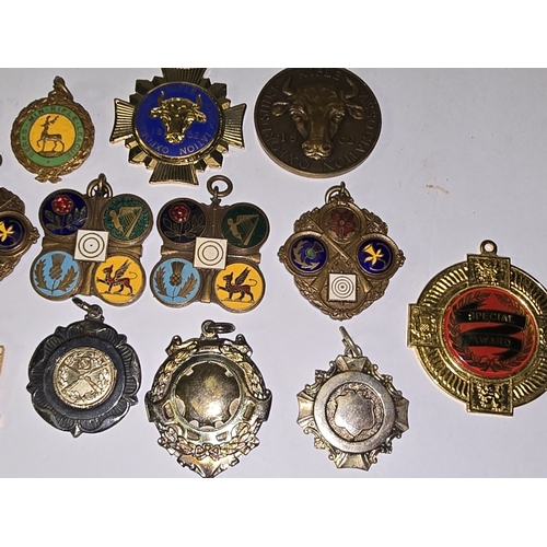 157 - A collection of vintage mostly rifle related medals/fobs to include National Small Bore Rifle Associ... 