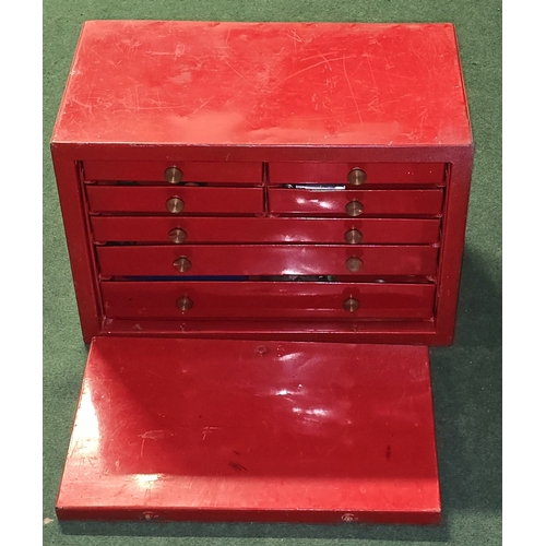 162 - A red metal 4 over 3 engineers tool chest with contents 36x54x31cm.