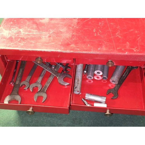 162 - A red metal 4 over 3 engineers tool chest with contents 36x54x31cm.