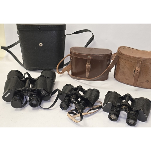 169 - Three pairs of vintage binoculars all with original cases.