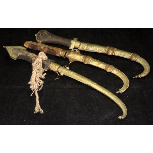 171 - A small collection of reproduction ceremonial curved swords