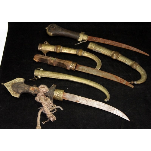 171 - A small collection of reproduction ceremonial curved swords