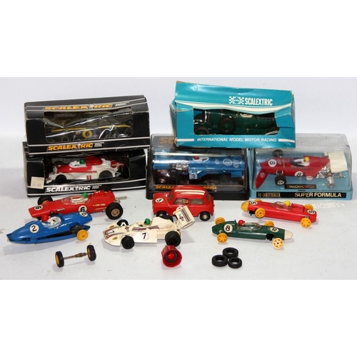 332 - A collection of vintage Scalextric slot car vehicles, some boxed, some for spares/repair (Bentley Bl... 