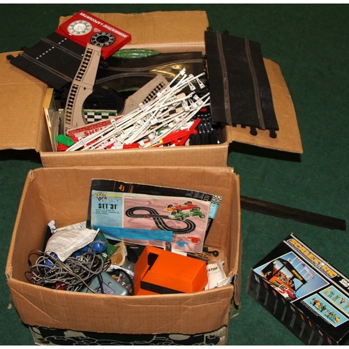 333 - A large quantity of vintage Scalextric track, trackside buildings and accessories, people etc. Inclu... 