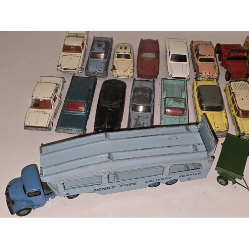 323 - Collection of vintage play worn Dinky die cast vehicles to include Pullmore car transporter.