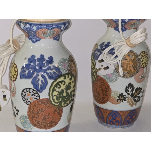 20 - A pair of antique Japanese porcelain decorative vases (possibly Karatsu). Have been more recently co... 